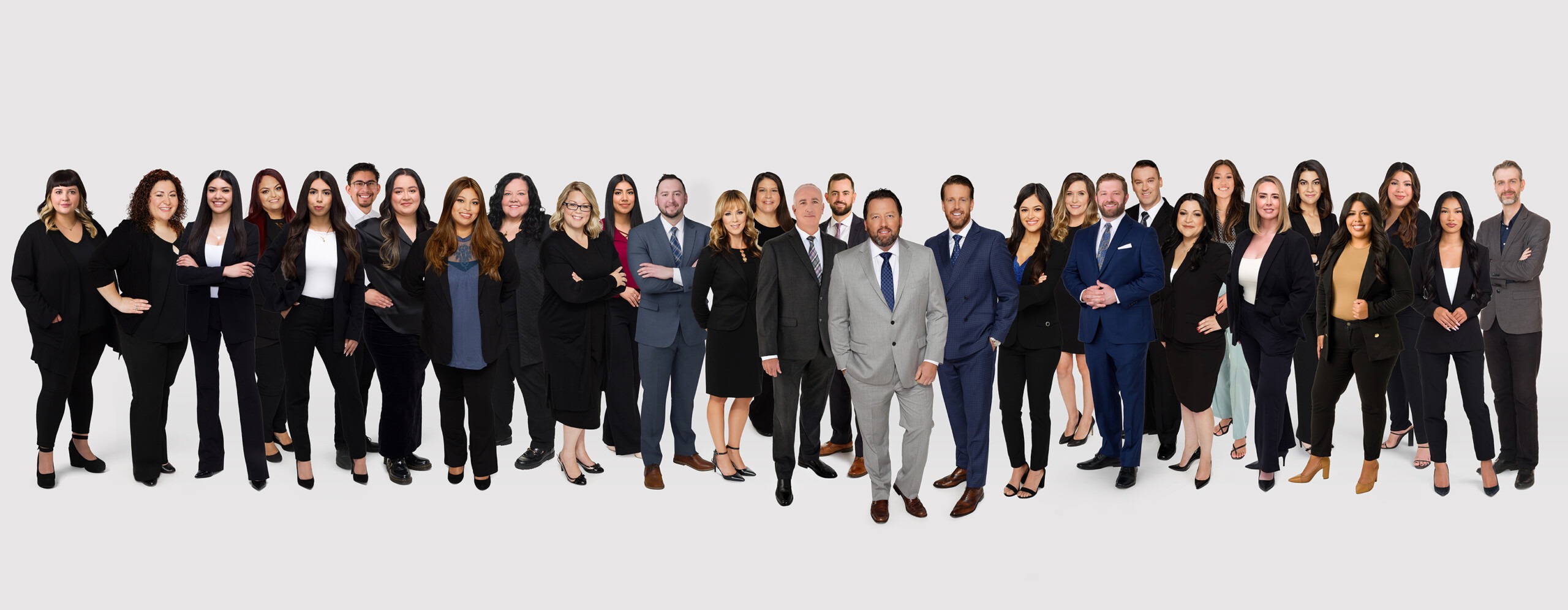 las-vegas-legal-team The entire Benson & Bingham team from all their locations is seen together as a group. The lead attorneys, secretaries, legal assistants, and others are all present.